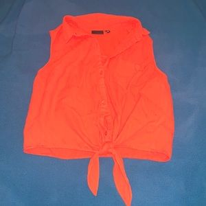 Orange sleeveless blouse with ribbed pattern